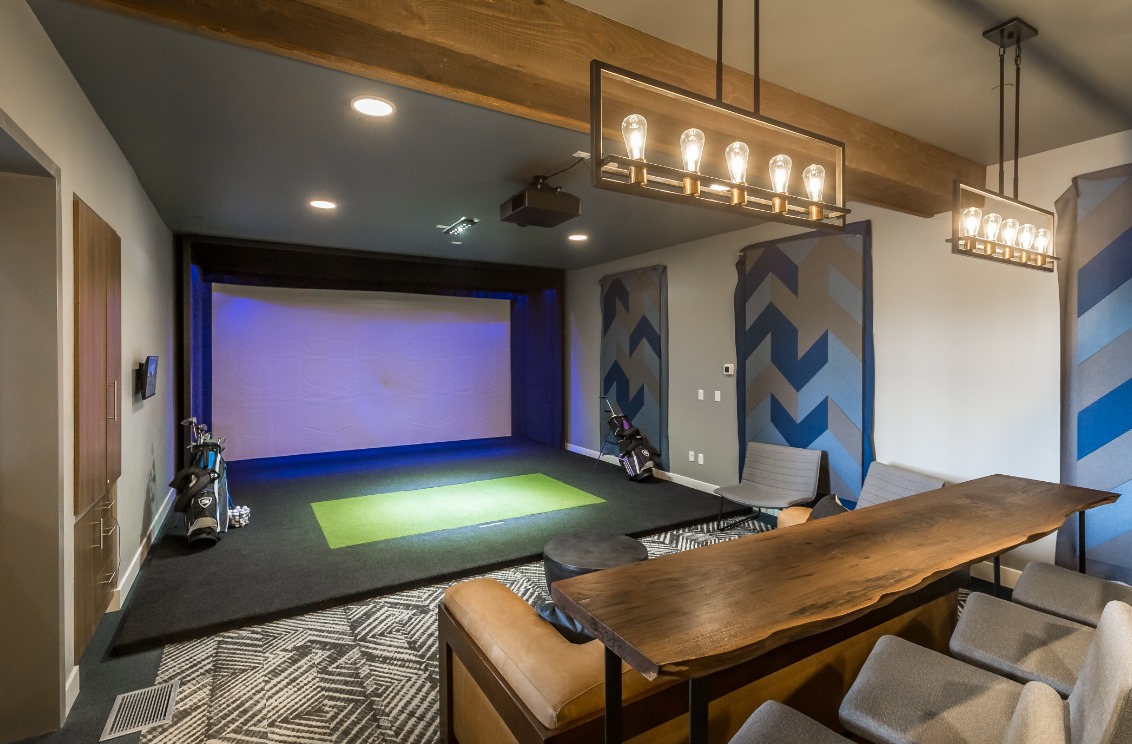 Golf Simulator Entertainment Room at 225 Sycamore Apartments in Wichita, KS
