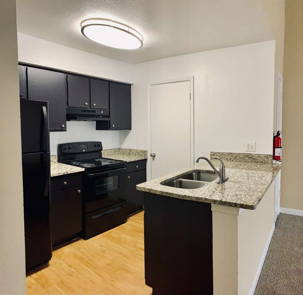 Fully Equipped Kitchen at Ashford Pointe Apartments in Houston, Texas