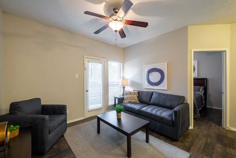 Well-Lit Living Rooms at Ashton Oaks in McKinney, TX