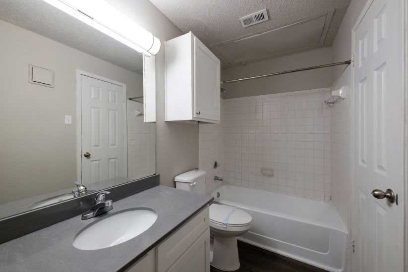 Well-Lit Bathrooms at Ashton Oaks in McKinney, Texas