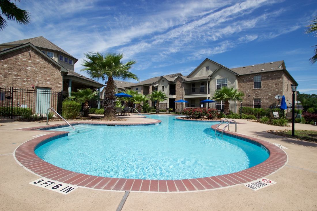 Sparkling Outdoor Pool at Beaumont Trace Apartments in West Beaumont, TX