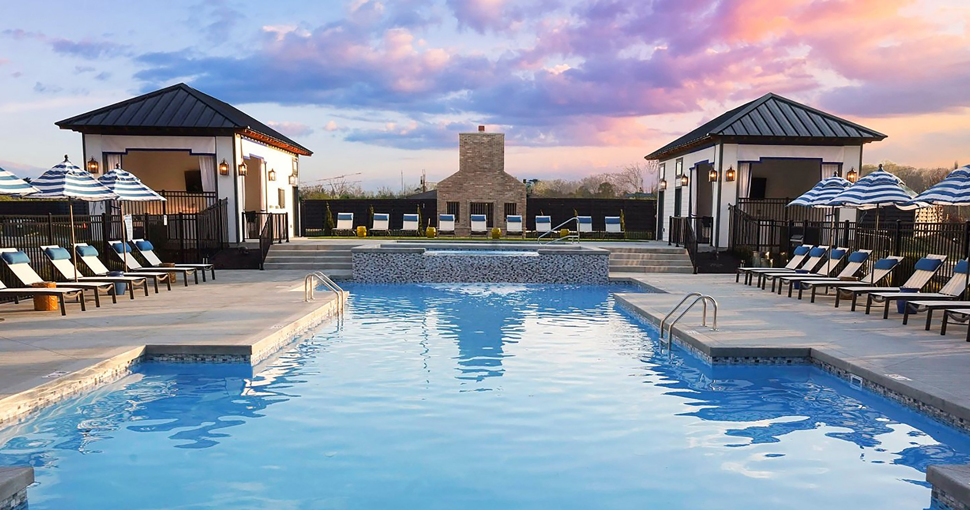 Expansive Pool Area with Sundeck at Belmont House