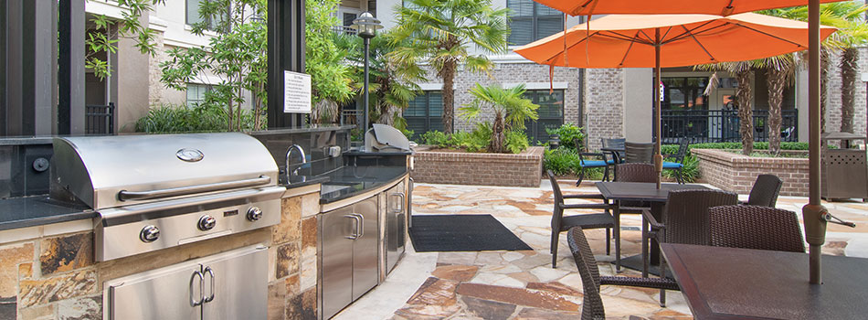 Outdoor BBQ Station and Lounge Area at Brookleigh Flats Luxury Apartment Homes 