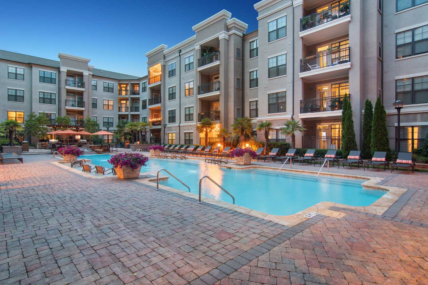Relaxing Pool Lounge Area with Fountain at Brookleigh Flats Apartments