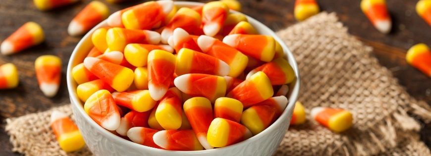 Add Seasonal Flair to Your Apartment with This DIY Candy Corn Garland Cover Photo