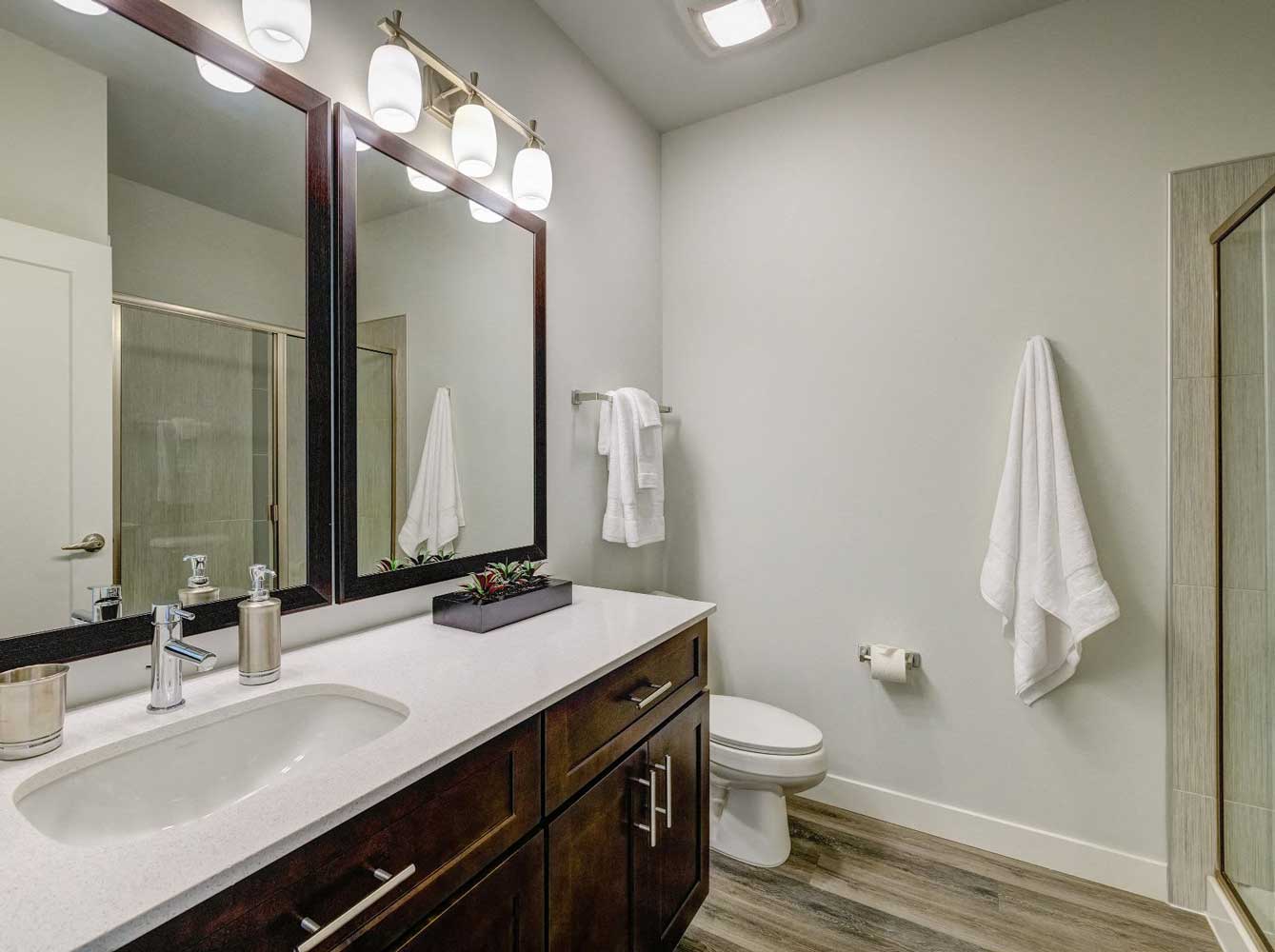 Bathroom with Spacious Vanity at Buckingham Place Apartments in Des Plaines, IL
