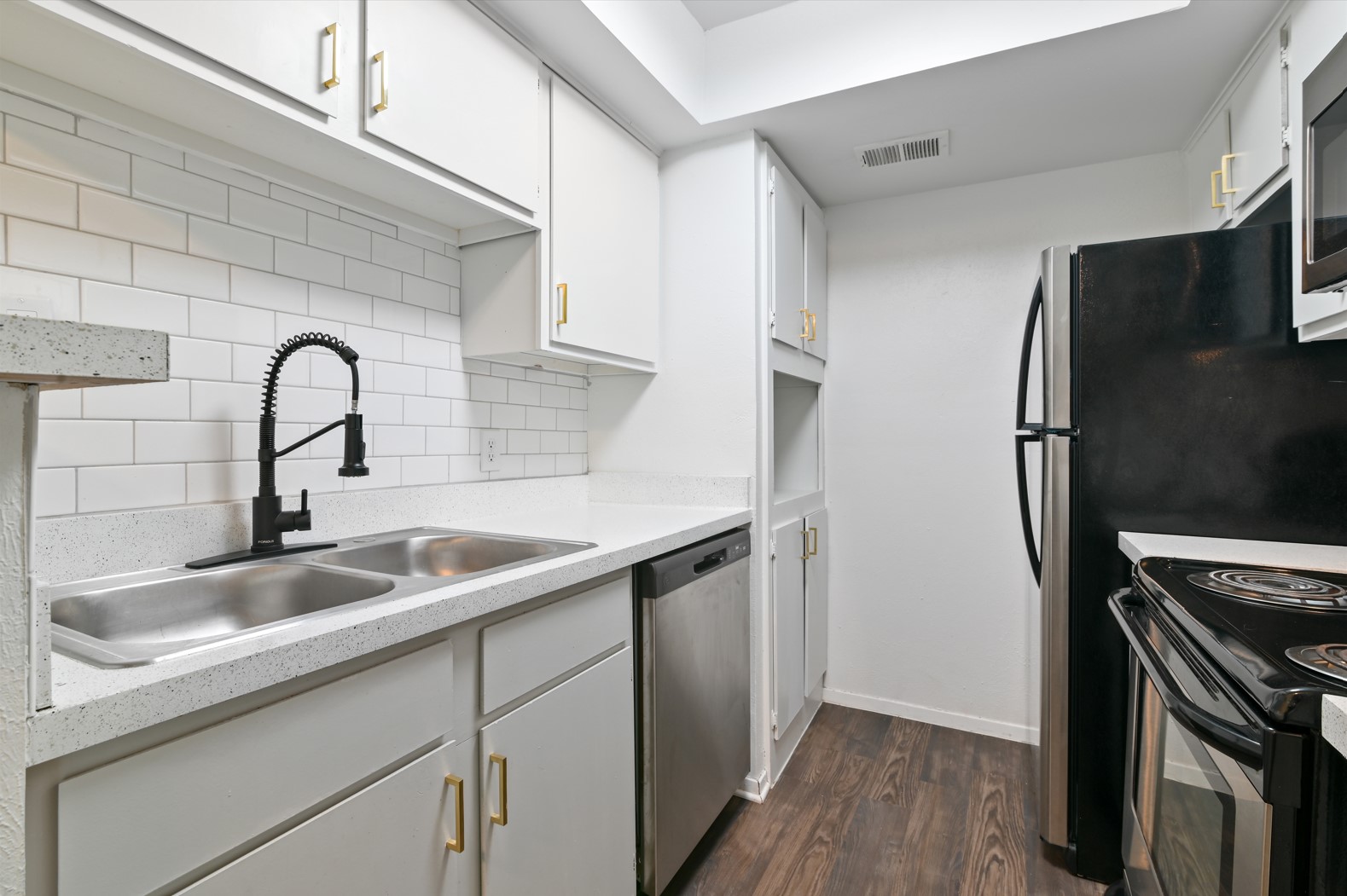 White Modular Cabinetry and Twin Kitchen Aluminum Sinks 