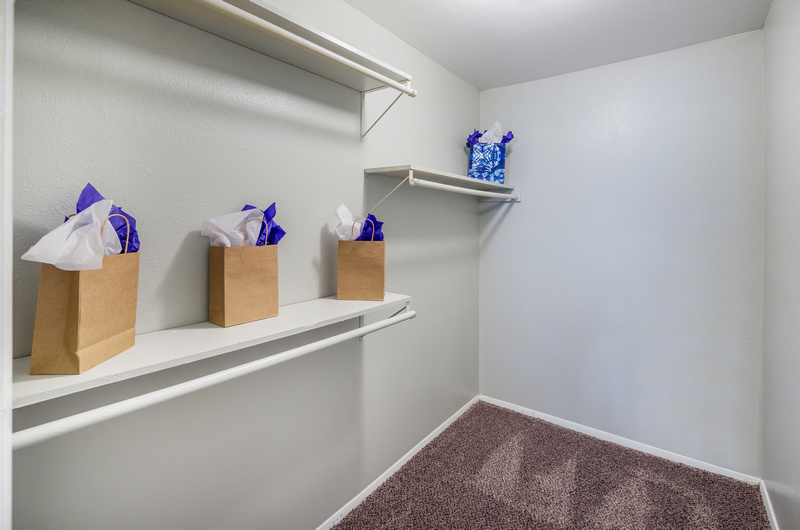 Walk-In Closets with Shelving at Topaz Apartments in San Marcos, TX