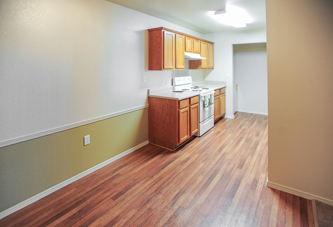 Kitchen with Updated Appliances at Chapel Ridge of Council Bluffs Apartments
