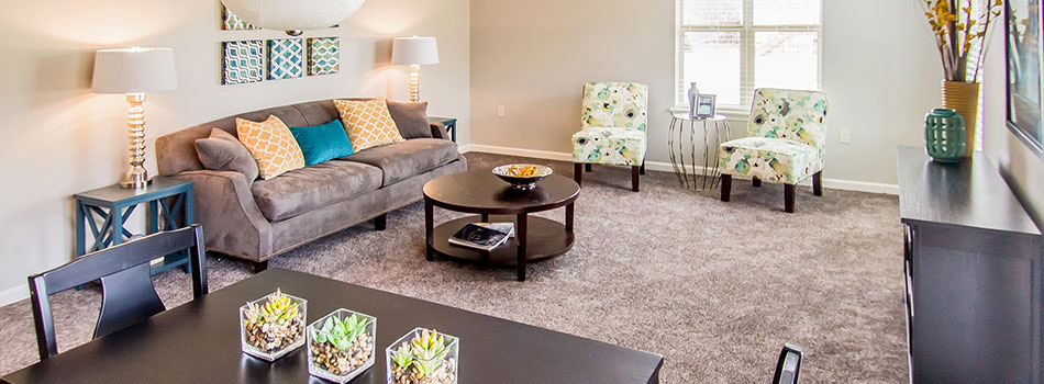 Spacious and carpeted living area at Chateau at Hillsborough