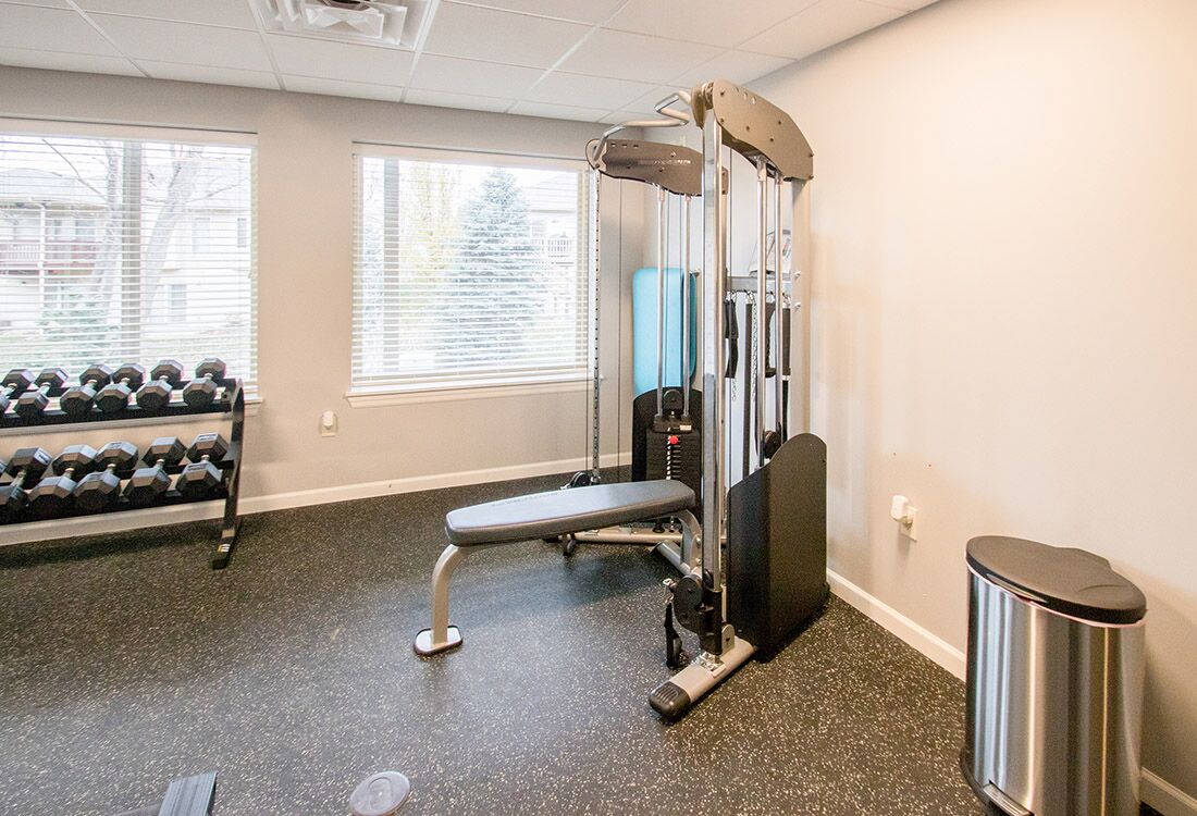 Weight Machines and Free Weights at Chateau at Hillsborough Apartments in Omaha, NE