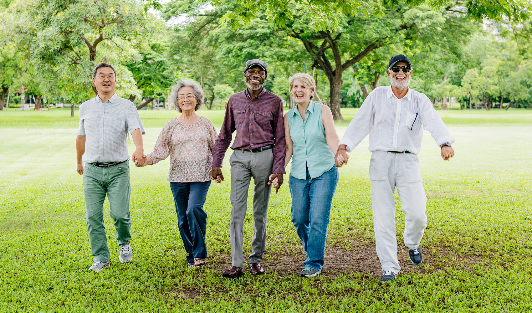 Five senior residents walking outdoor