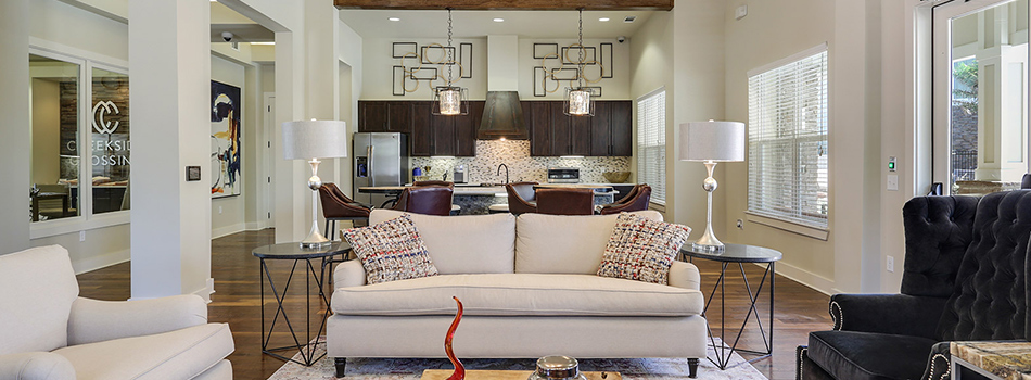 Spacious Clubhouse with Lounge and Kitchen Area at Creekside Crossing Apartments