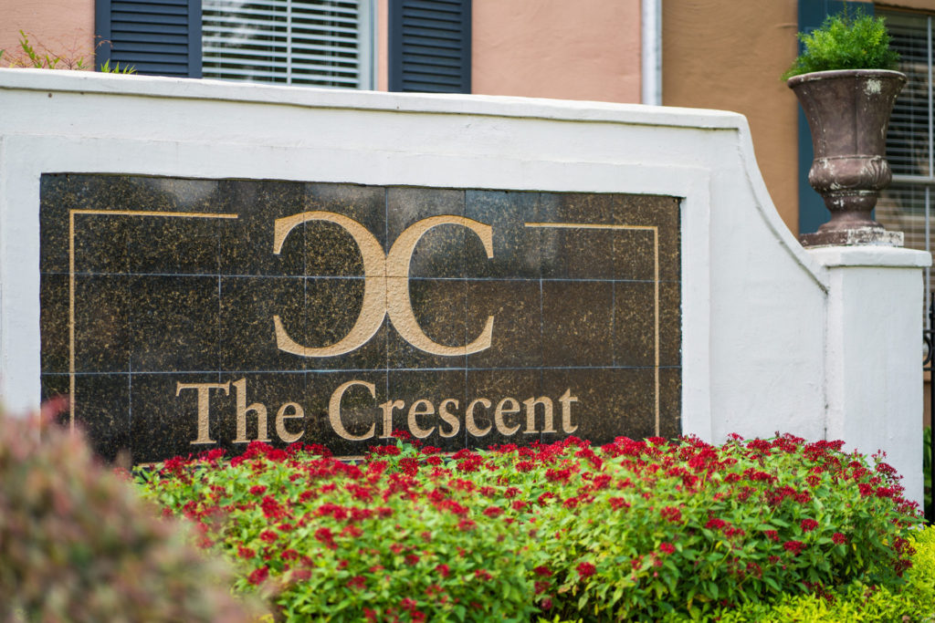 Property Sign at The Crescent at River Ranch Apartments in Lafayette, LA