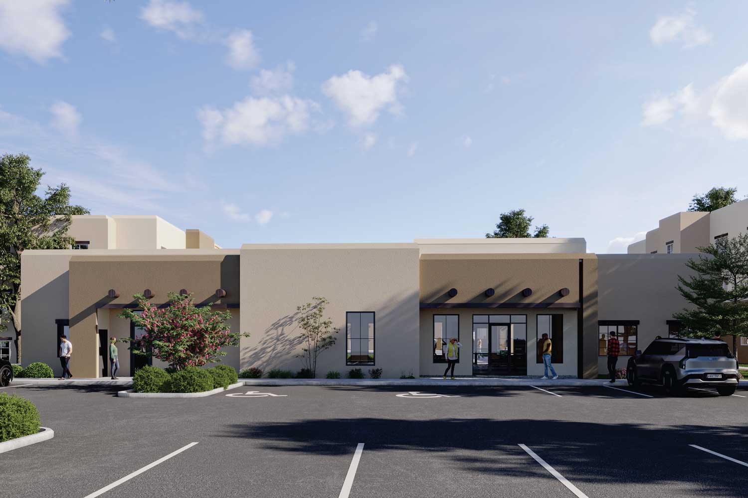 Community entrance and leasing office exterior at Cresta Ranch Apartments with resident parking and desert-inspired landscaping in Santa Fe, New Mexico.