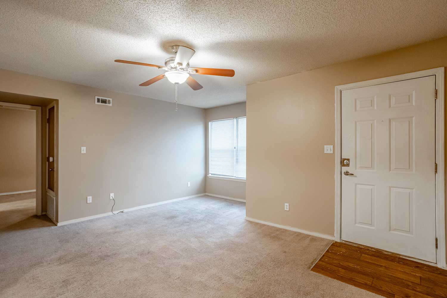Apartments with Carpeted Flooring at Crown Ridge Apartments in Fayetteville, Arkansas