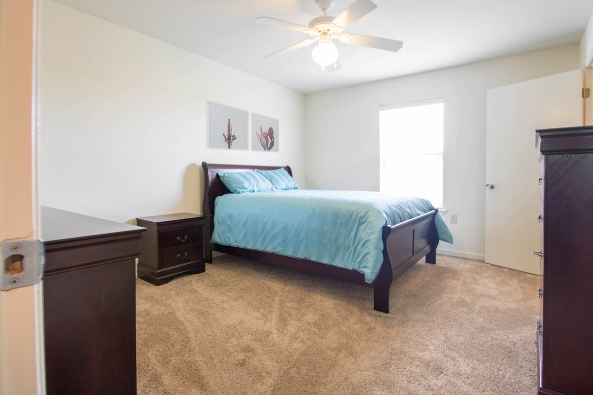 Carpeted Bedrooms at Cypress Bend Apartments in West Beaumont, Texas