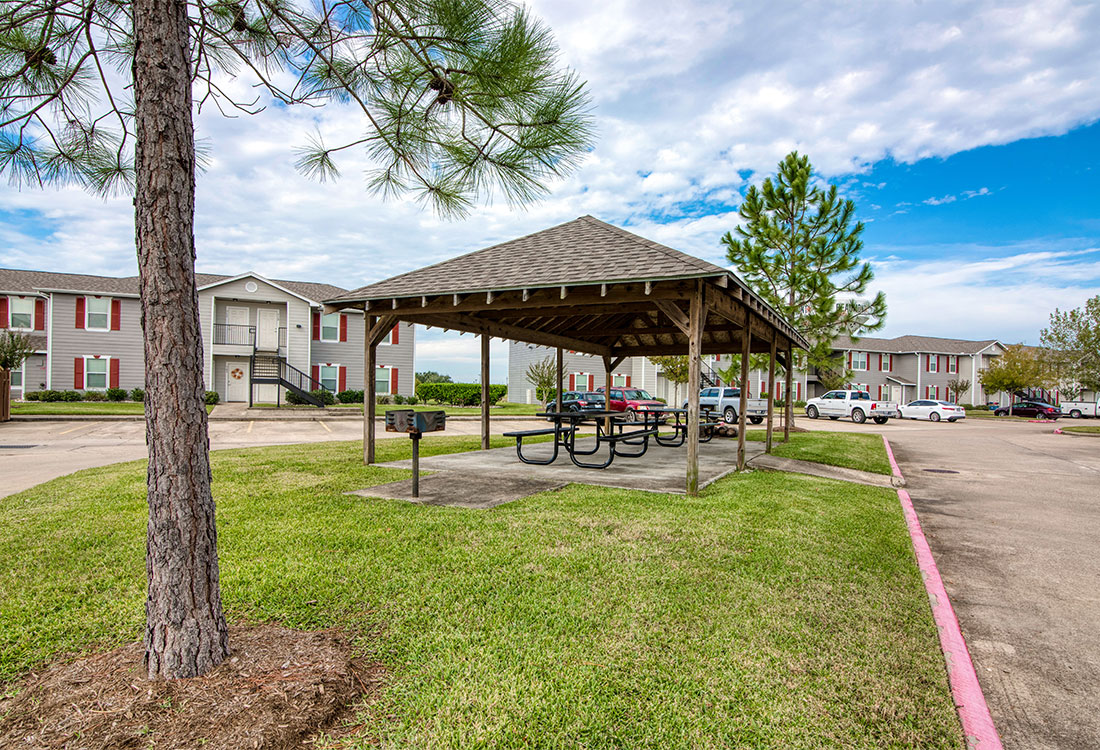 Green Space and Outdoor Picnic Area at Cypress Bend Apartments in West Beaumont, TX