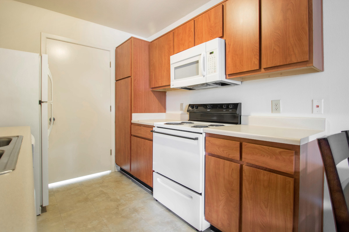 Ample Cabinet Space in Kitchens at Cypress Bend Apartments in West Beaumont, Texas