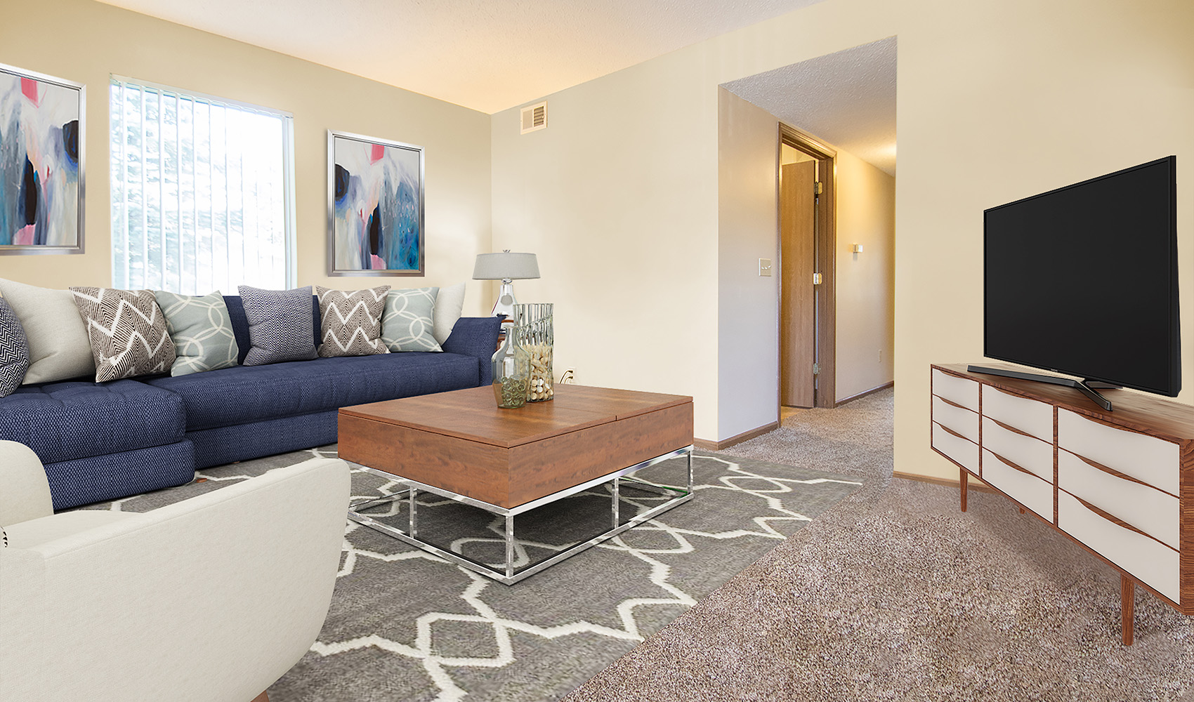 Well-lit Living Area with TV Entertainment