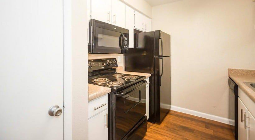 Fully Equipped Kitchen at O'Connor Oaks Apartments in San Antonio, TX