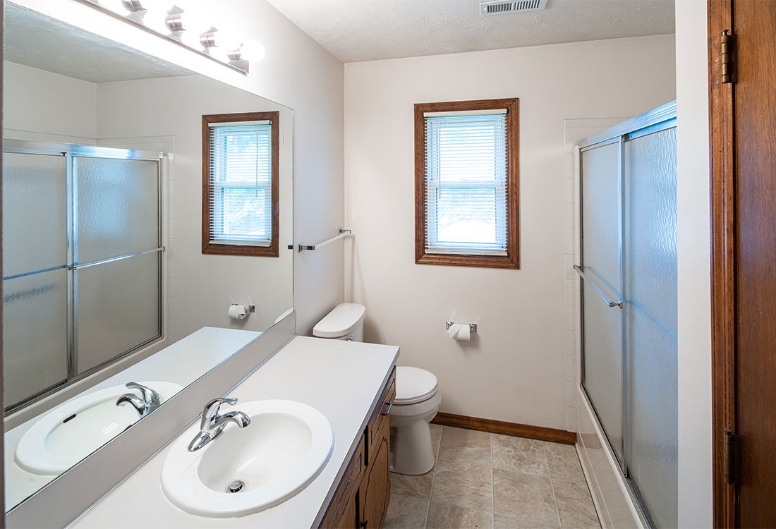 Bathroom with Large Vanity at Elkhorn Apartments in Elkhorn, NE