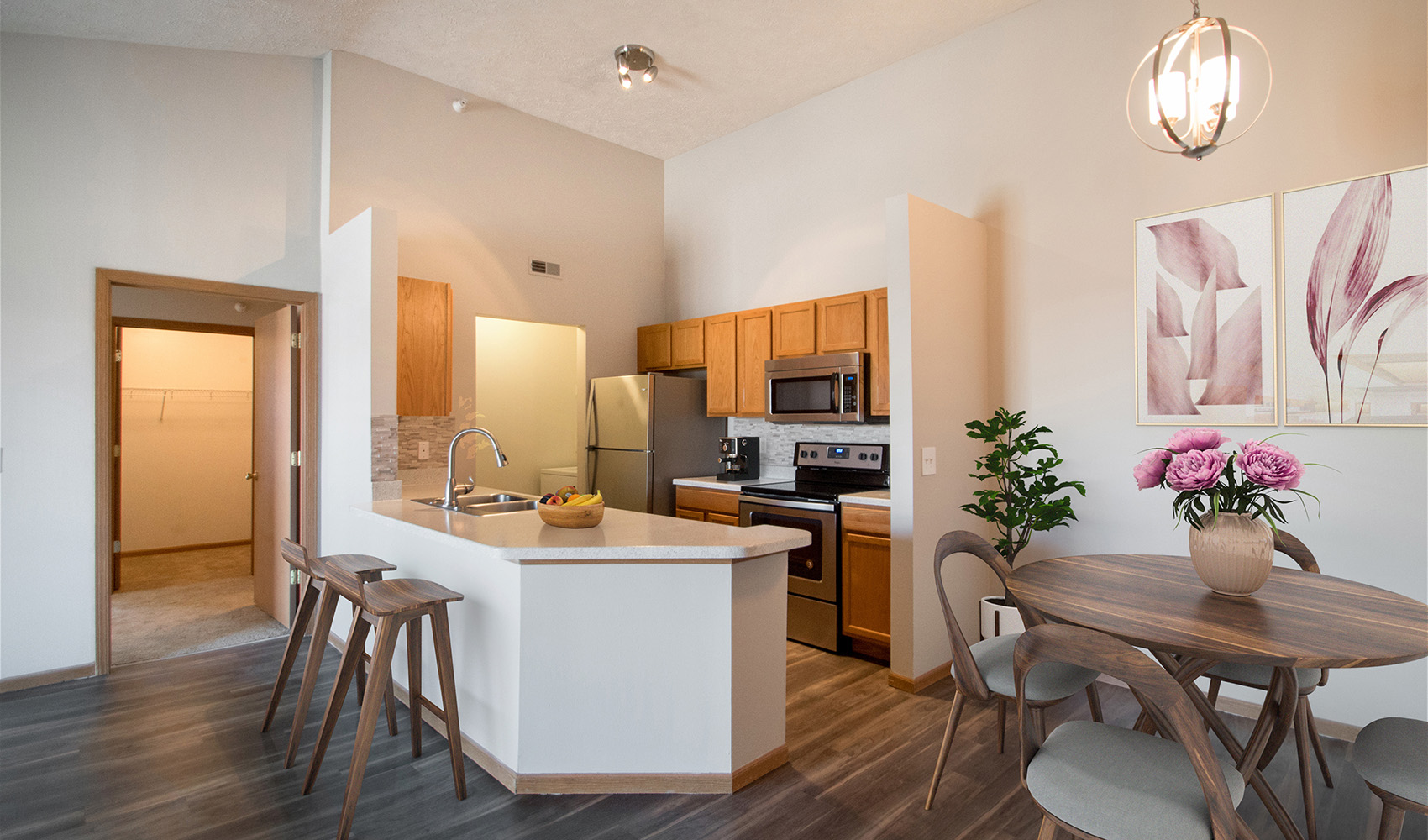 Fully Equipped Kitchen with Breakfast Bar at Fairfax Apartments in Omaha, NE.