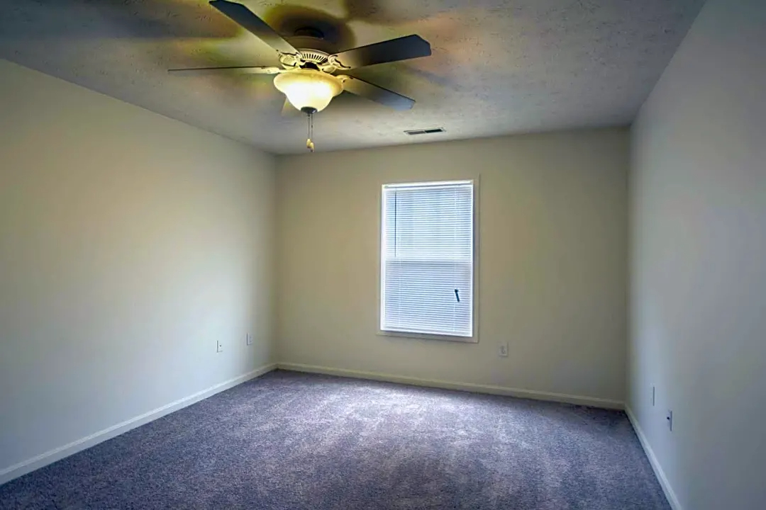 Bedrooms with Ceiling Fans at Falcon Crest Apartments