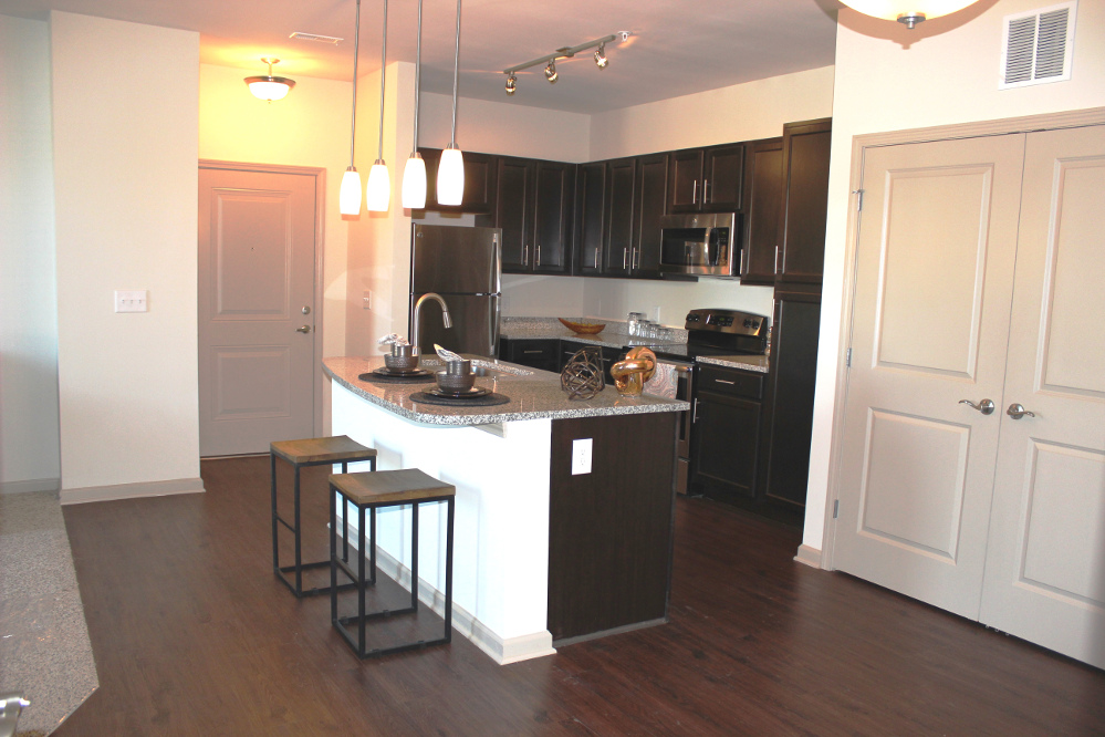 Kitchen With Granite Counter-tops at the Reserve at Fountainview Apartments in Saint Charles, MO
