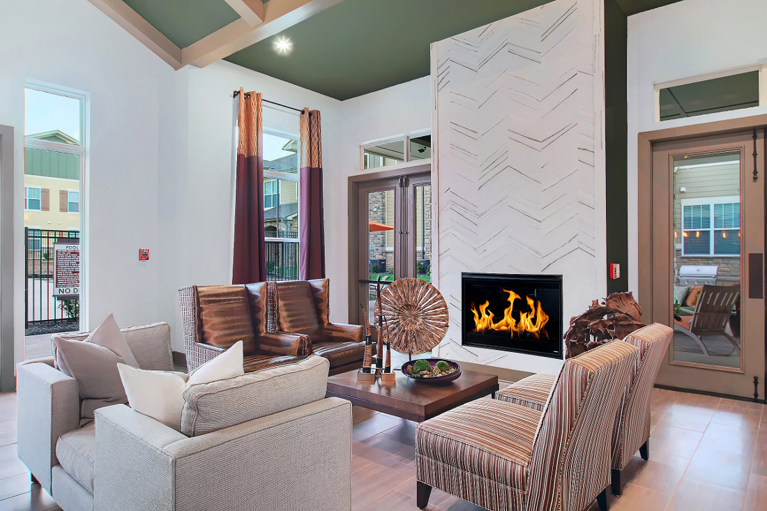 Clubhouse Fire Place at the Reserve at Fountainview Apartments in Saint Charles, MO