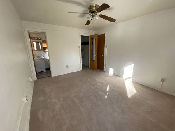 Bedroom with Ceiling Fan at Garden Villa Apartments in Pittsburgh, PA