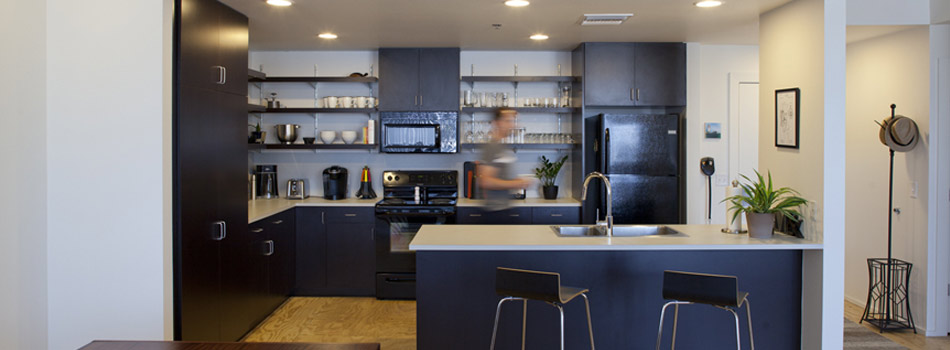 Fully Equipped Kitchen with Black Appliances
