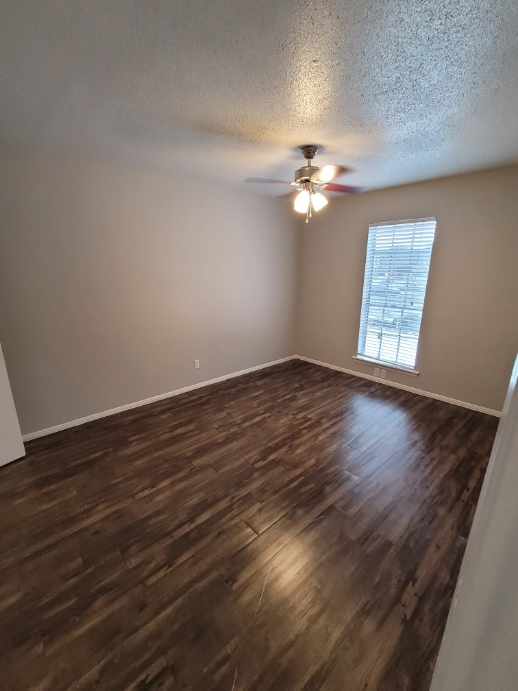 Upgraded flooring and Ceiling Fans in All Rooms at Hamilton Place Apartments in San Antonio, Texas