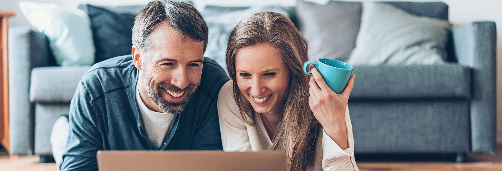 Couple Browsing on their Laptop