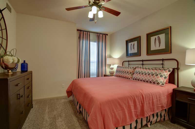Bedrooms with Ceiling Fans at Hilltop at Shavano Apartments in San Antonio, TX