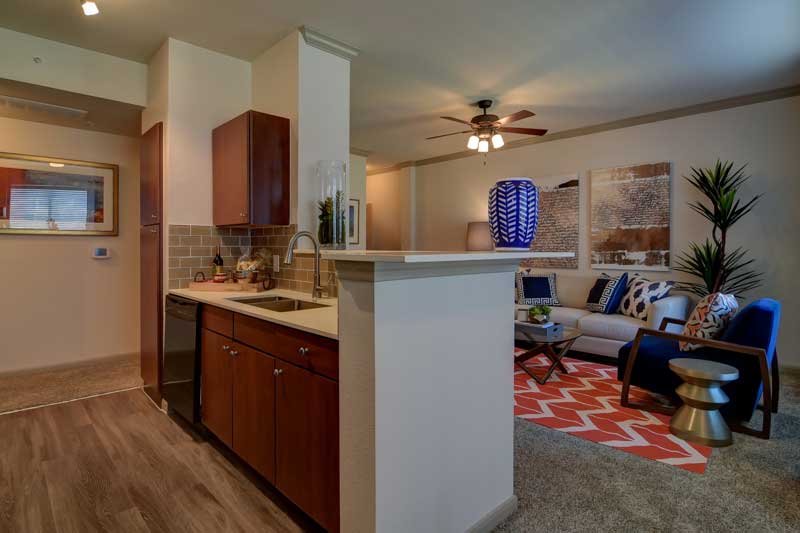 Kitchen Opens Into Living Room at Hilltop at Shavano Apartments in San Antonio, TX