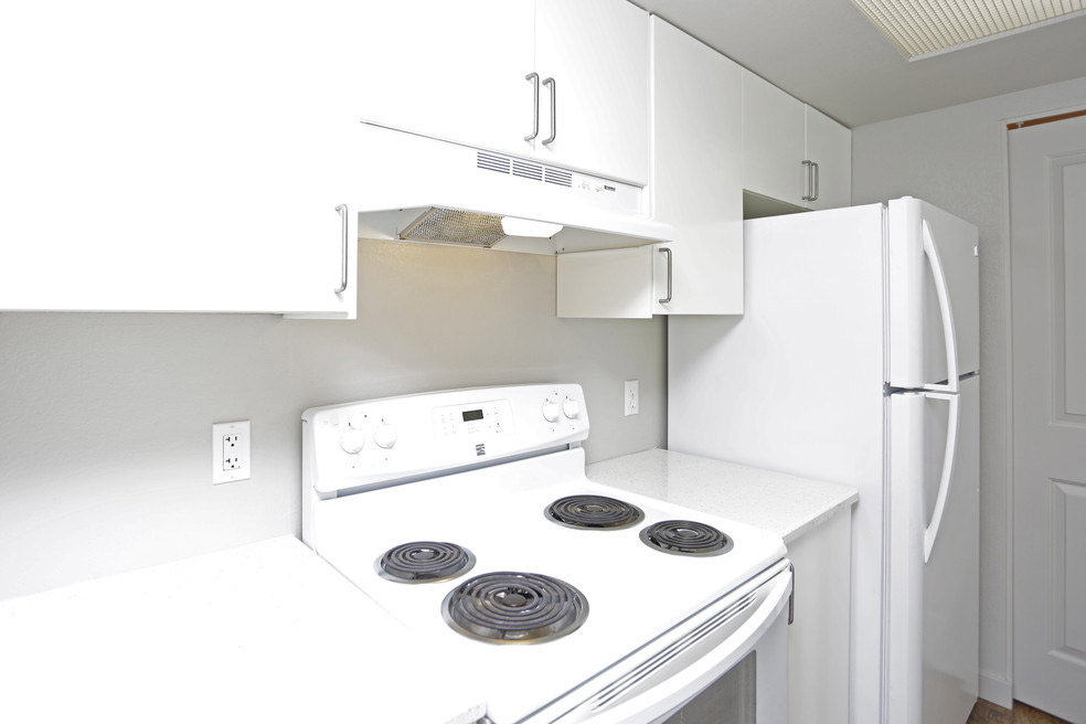 White Kitchen Appliances at Holladay Grove Apartments