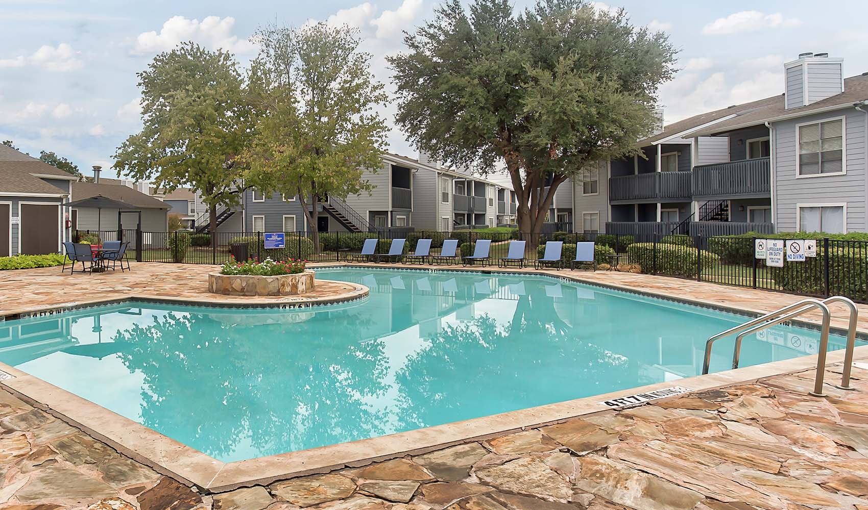 Outdoor Pool Area at Indian Run Apartments