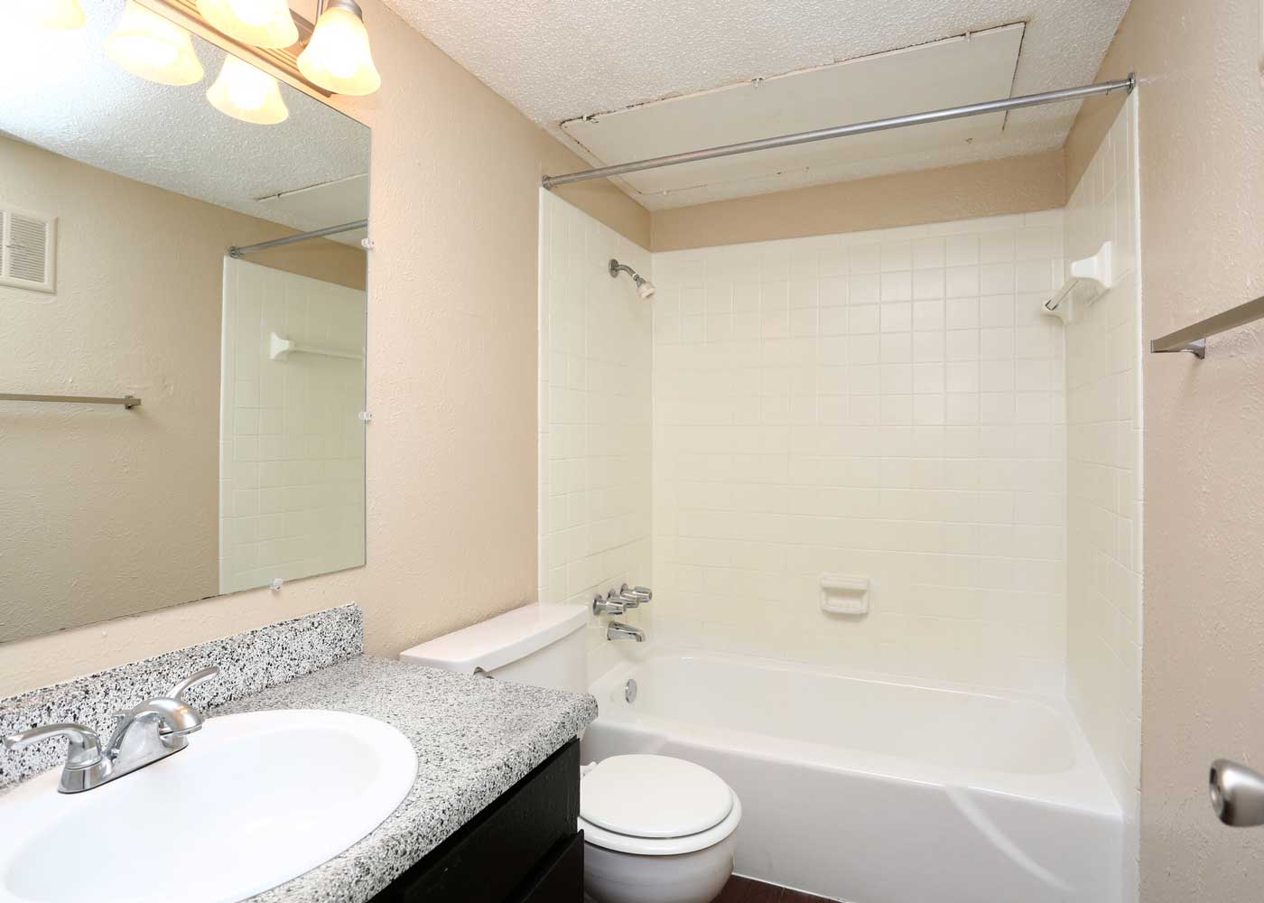 Refined Bathrooms at The Junction Apartments in Arlington, Texas