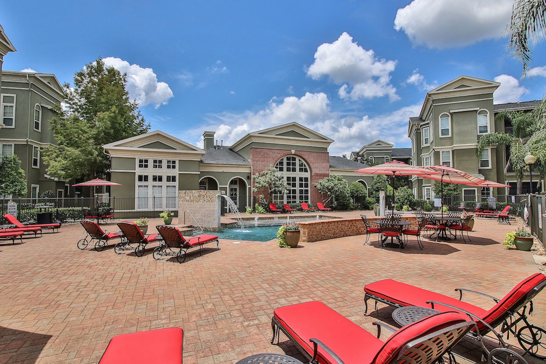 Poolside Lounge Area at King's Cove Apartments in Kingwood, Texas 