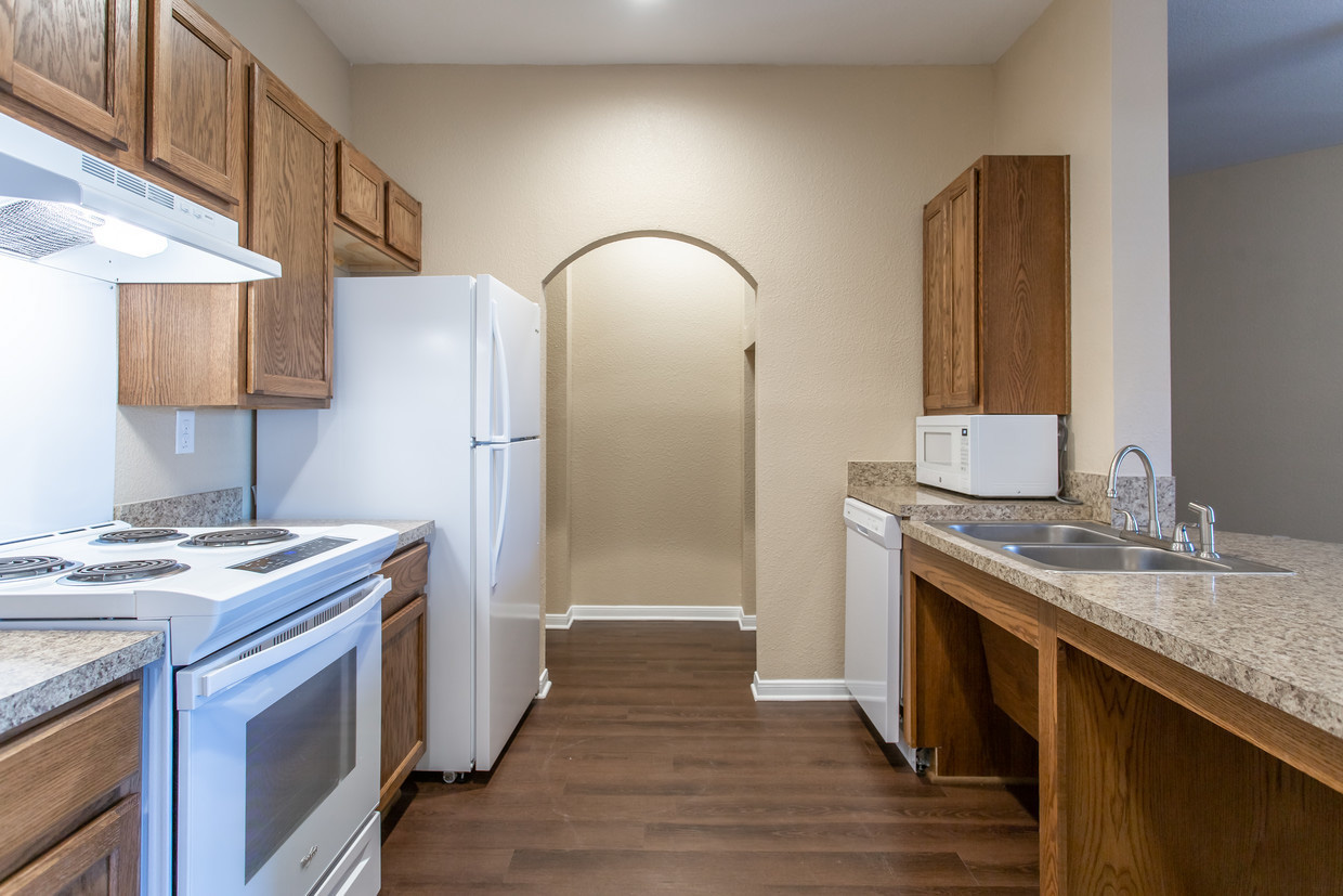 Galley-Style Kitchen at the Legacy Senior Living Apartments in Port Arthur, TX