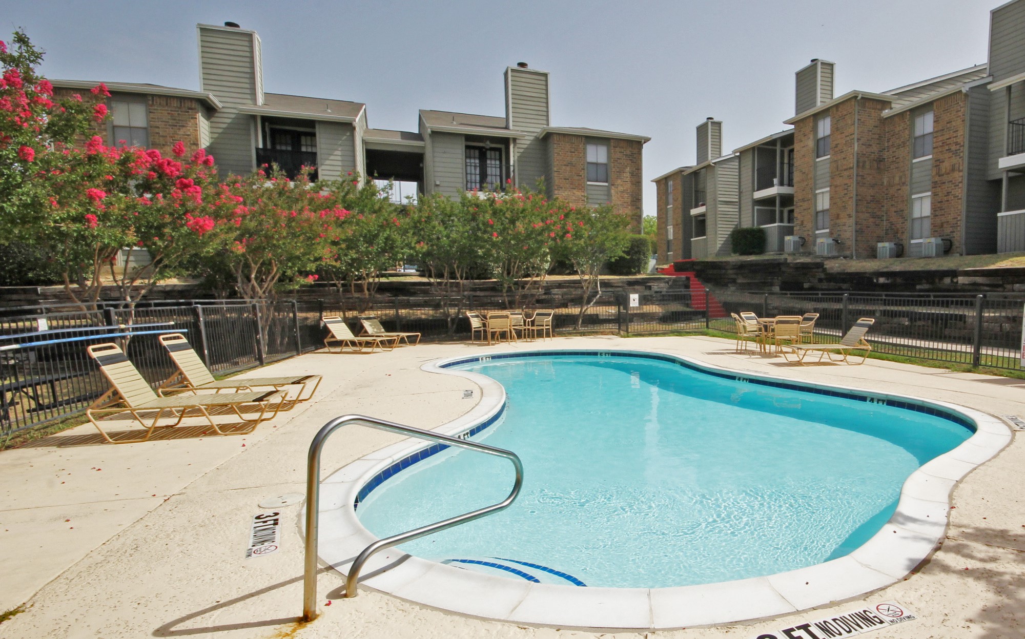 Outdoor Pool Area at Marine Creek Apartments in Fort Worth, Texas