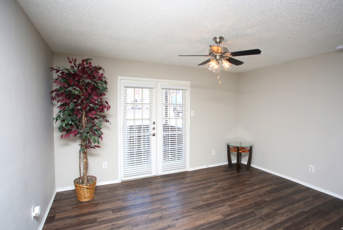 Open Floor Plan with Ceiling Fan  at Marine Creek Apartments in Fort Worth, Texas