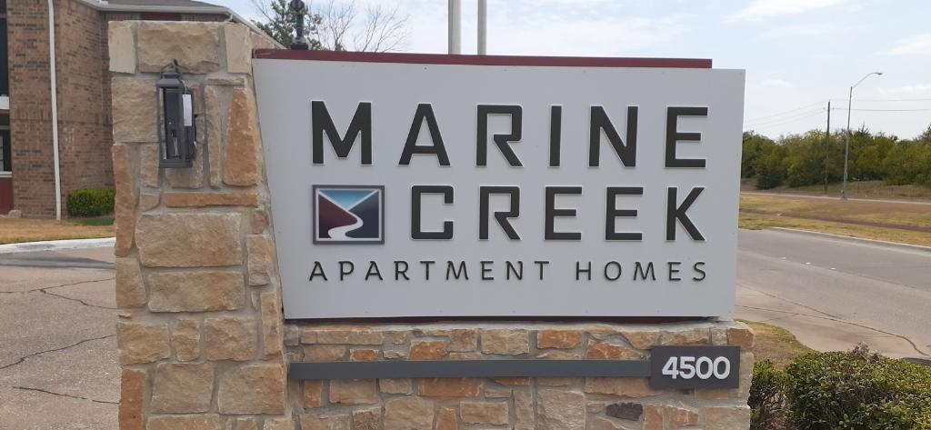 Property Signage at Marine Creek Apartments in Fort Worth, Texas