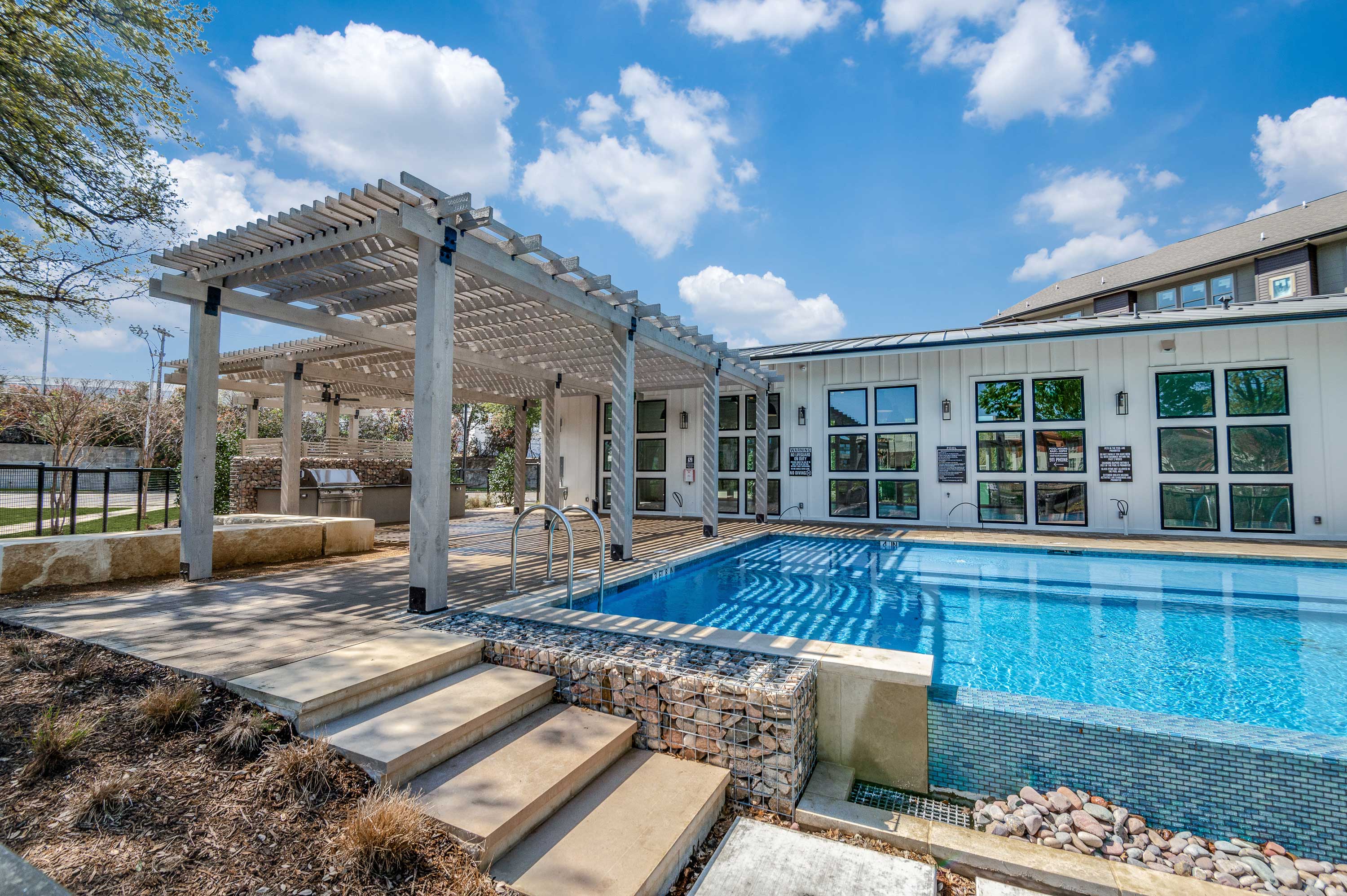 Poolside Arbor Cabana with Grilling Stations at Midway Row House.