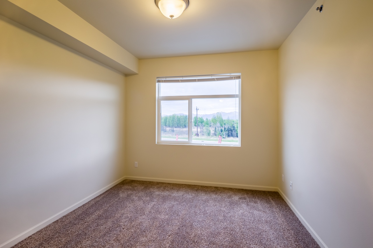 1BR Bedroom with Carpet Flooring and Single Hung Window