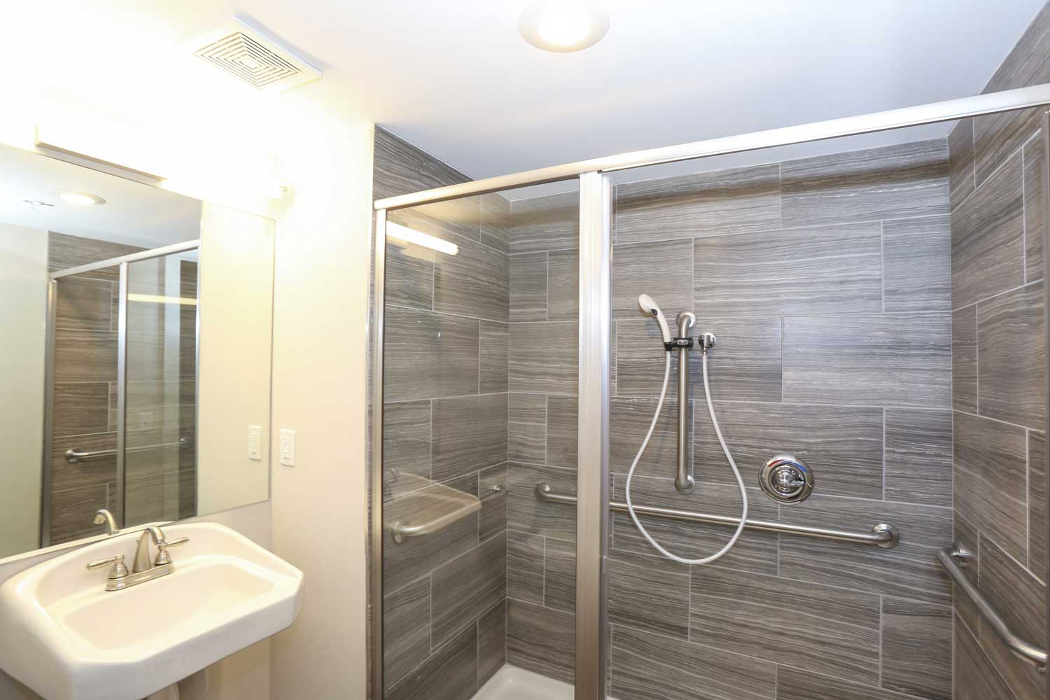 Tiled Shower Room in OGGI Lofts Apartments at Kansas City
