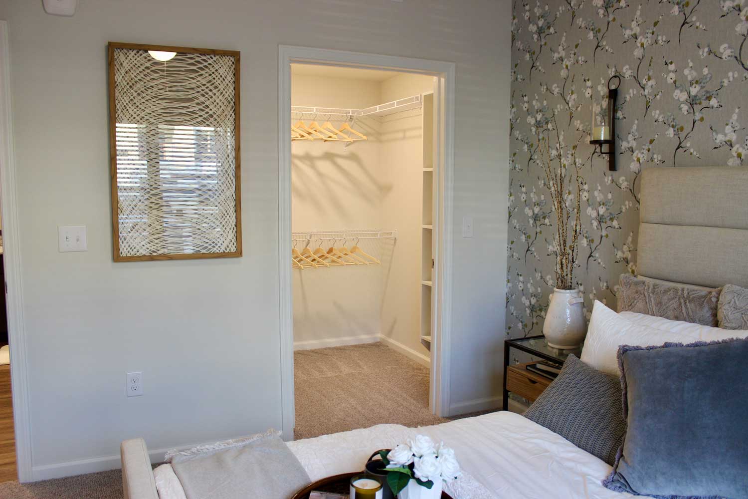 Bedroom With Big Walk-in Closets at Oxford at Santa Clara Apartments in Pflugerville, Texas