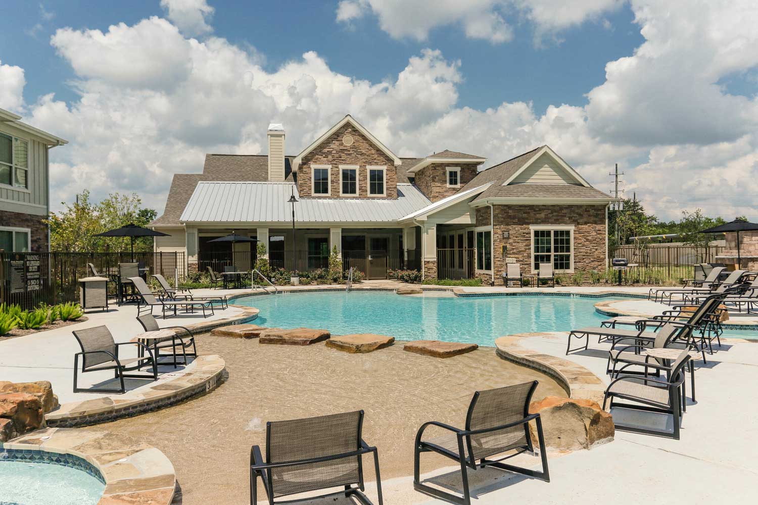 Cool Poolside Sundecks at Oxford at the Ranch Apartments in Waller, Texas