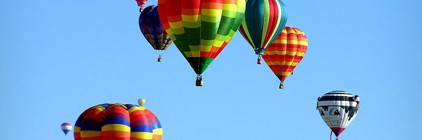 Up, Up, and Away! Watch Balloons Soar Across the Sky at the Plano Balloon Festival Cover Photo
